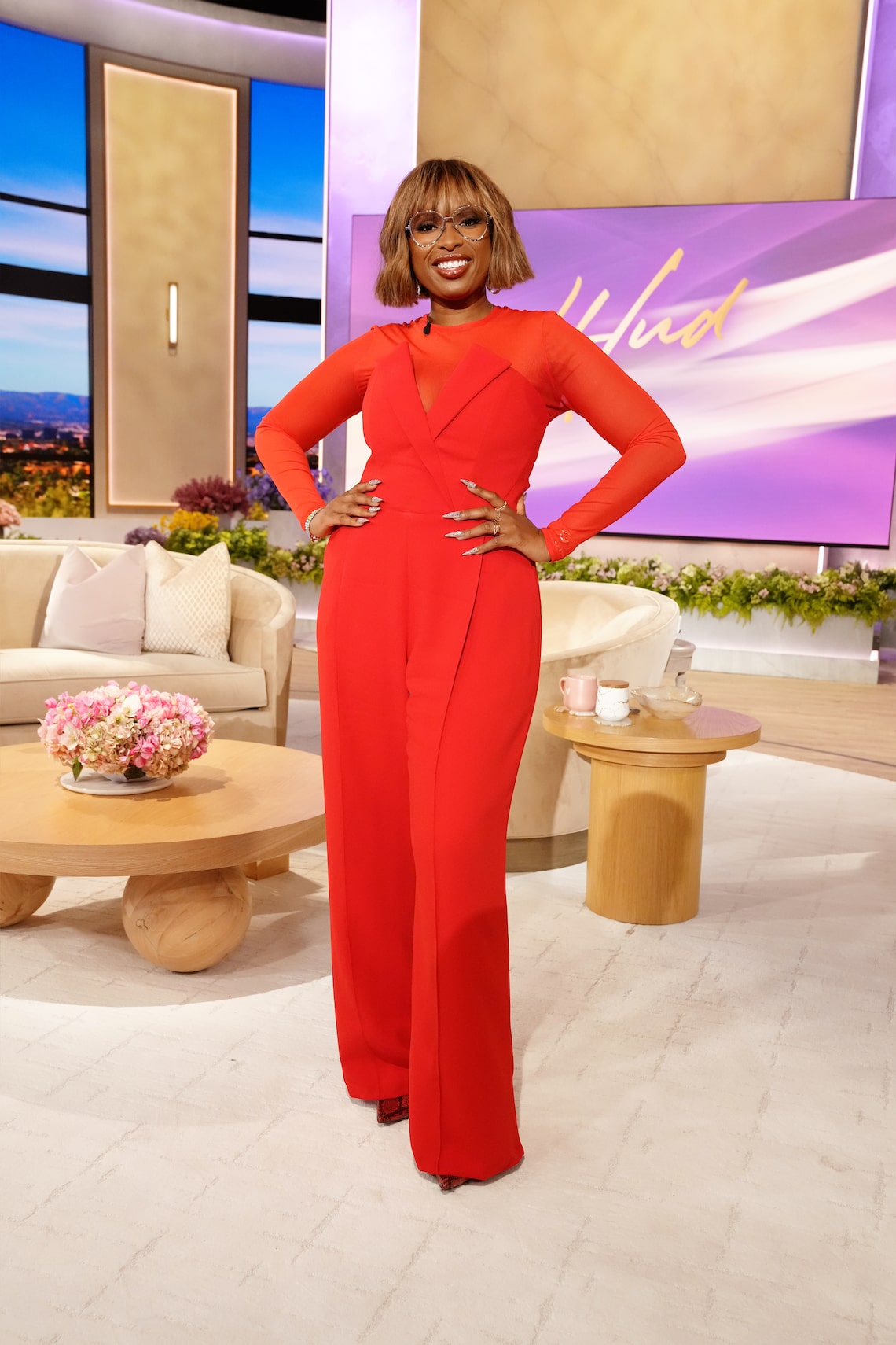 Jennifer Hudson kicked off Season 3 wearing a bright red Nadine Merabi jumpsuit paired with a sheer top from AFRM and python-printed heels from Jessica Simpson. JHud gave this look a personal touch by wearing a “Mama” necklace — a birthday gift from her son, David