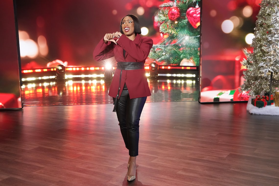Jennifer paired a sophisticated deep red blazer from Naked Wardrobe with a wide leather obi belt.